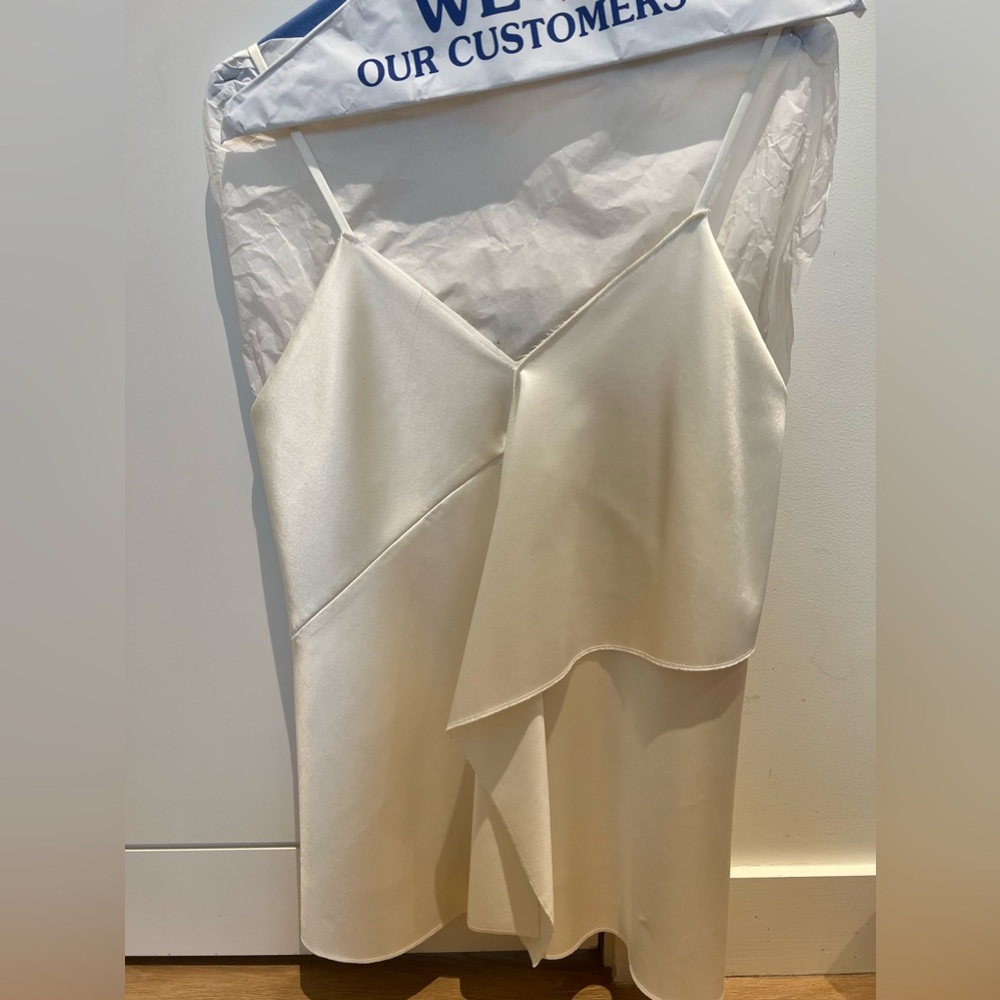 Philip Lim.1 white ivory silk strapless tank withh hangover ruffles. Size xs.